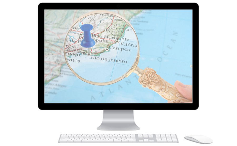 A magnifying glass on a map over Rio de Janeiro symbolizing website and software localization services
